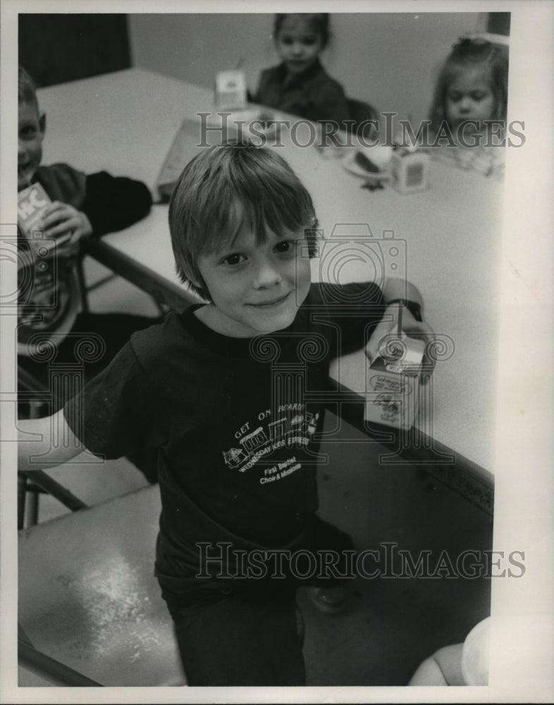 Press Photo Children drink milk at West End Christian School in Tuscaloosa - Historic Images