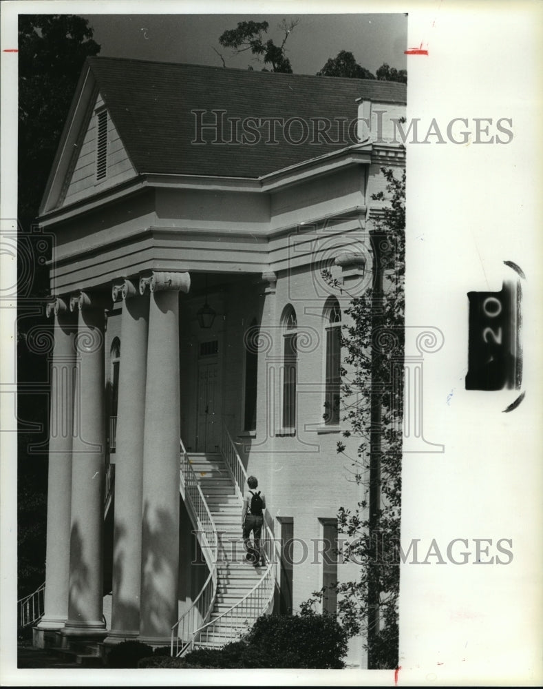 1980, Student walks into University of Montevallo&#39;s Reynolds Hall - Historic Images