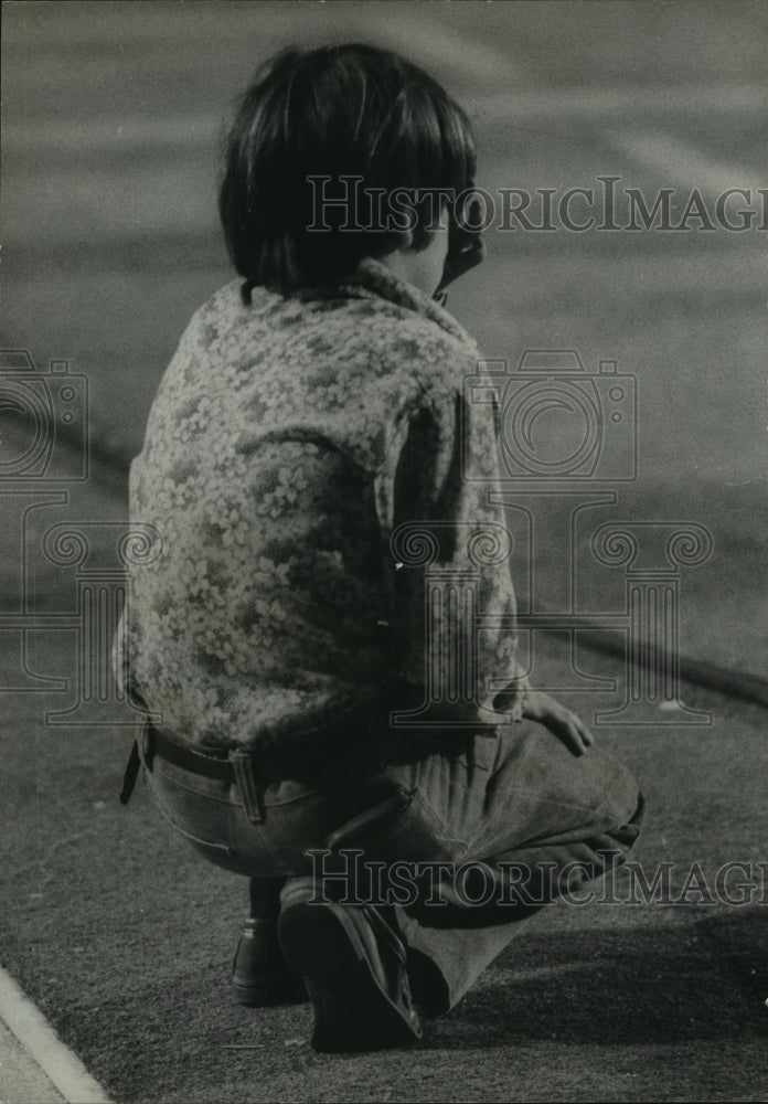 1972 Young boy kneels in prayer at Billy Graham crusade, Birmingham-Historic Images
