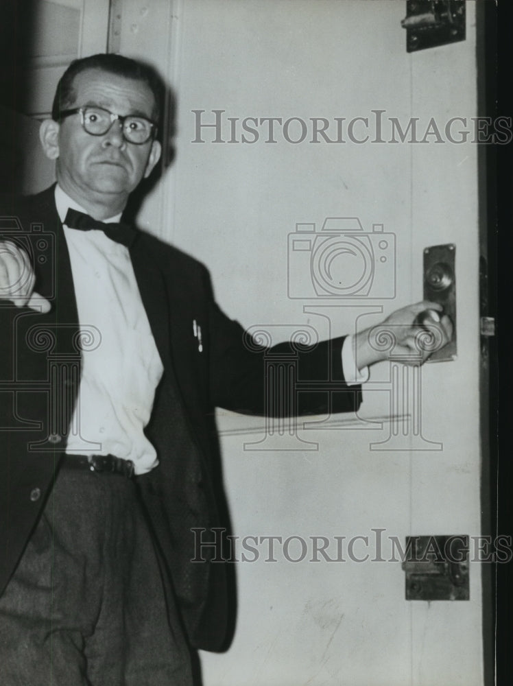 1961 Charles H. Thompson, Glencoe, AL tries to escape gambling raid-Historic Images
