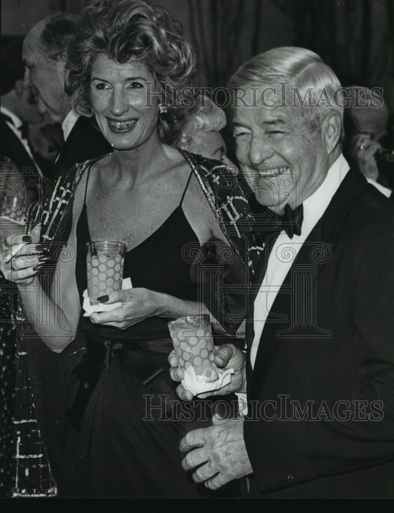 1982 Nancy Kissinger and Hunter Copeland at Gala 6 party - Historic Images