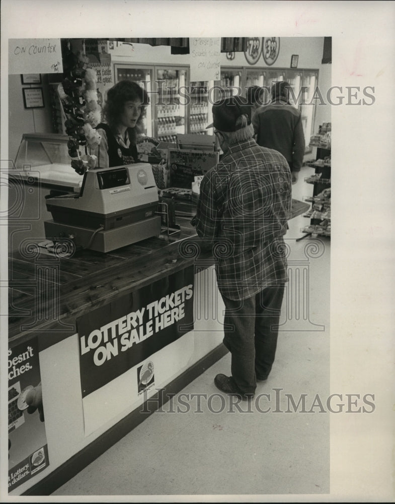 1988, Lisa Pelham Sells Lottery Ticket to Customer in Alabama - Historic Images