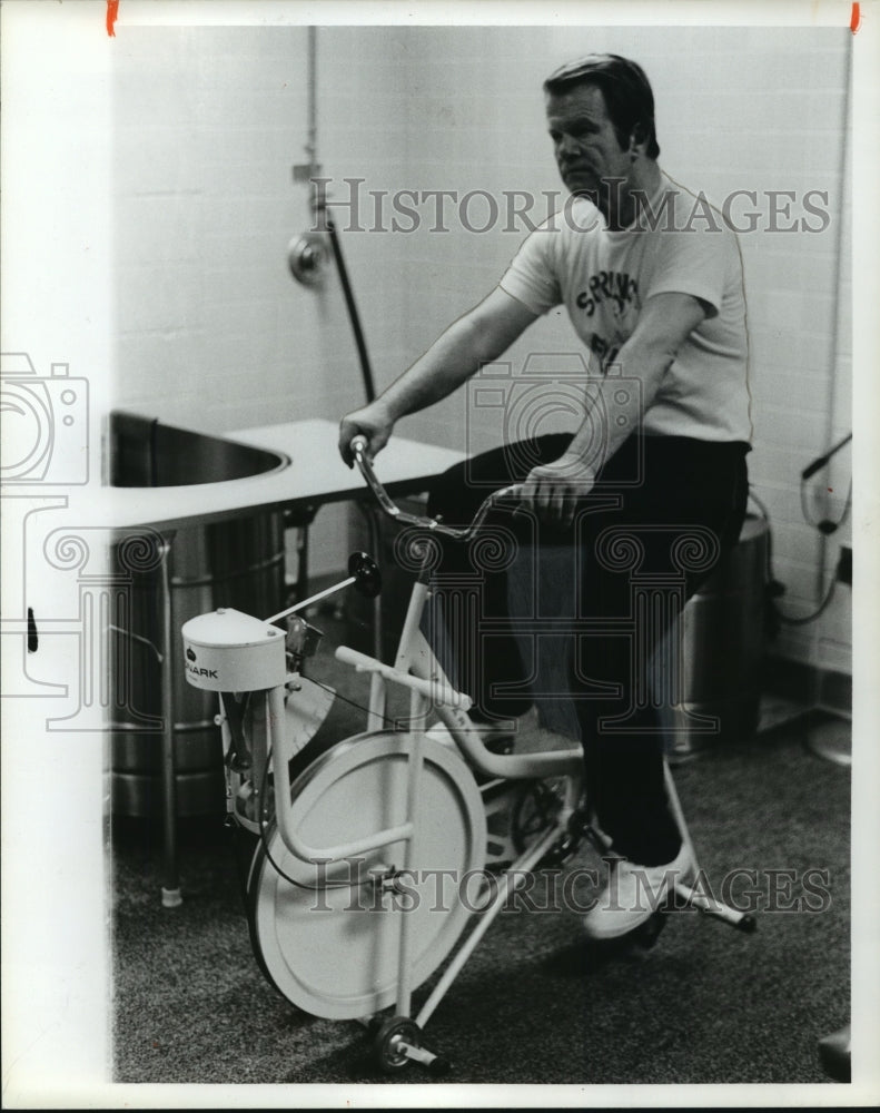 1979, Dr. Robert Guillot, University of North Alabama,on bike - Historic Images