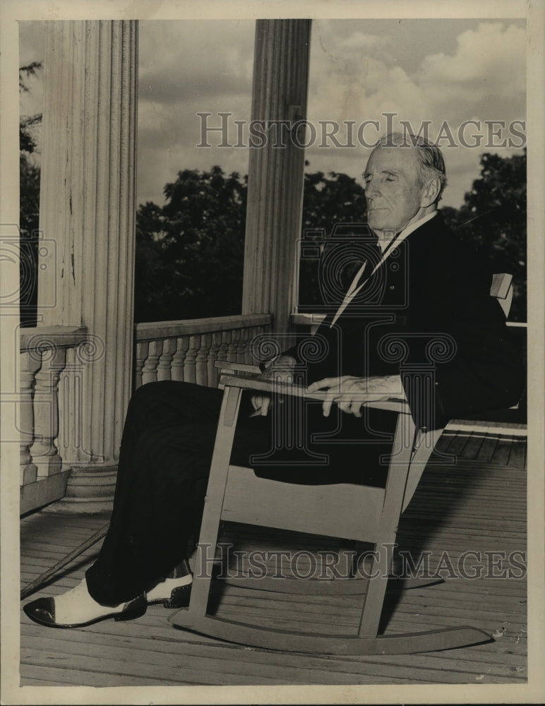 1948 Press Photo J. Thomas Heflin, "Cotton Tom" relaxing on porch, Alabama-Historic Images