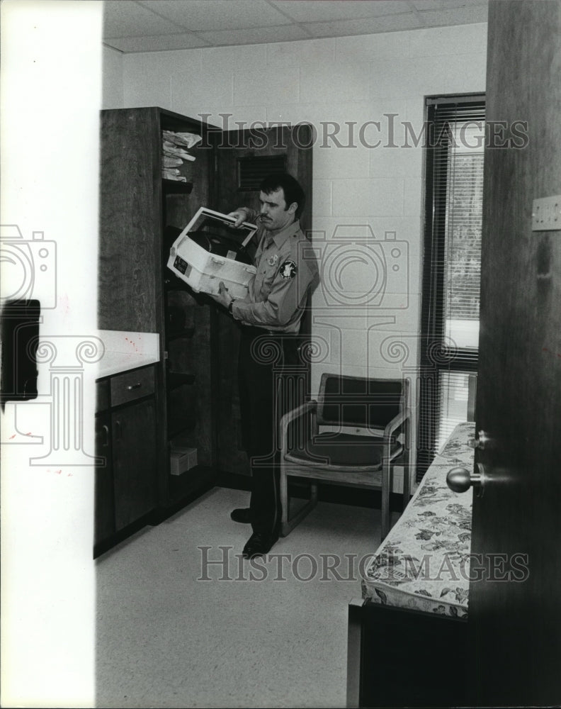 1980, Fireman checking supplies at Irondale, Alabama - abna13761 - Historic Images