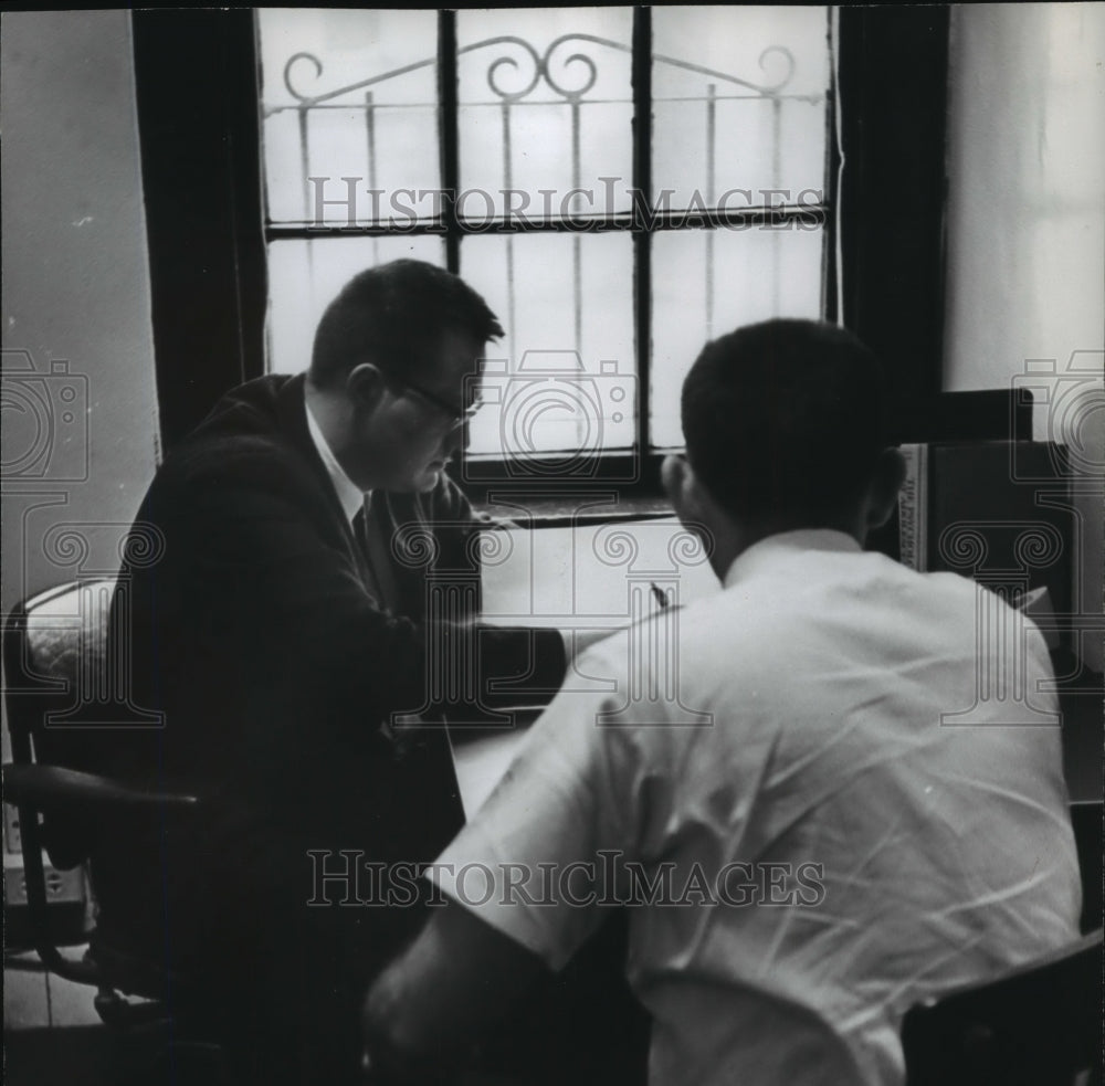 1965 Probation Officer and unidentified man in office, Alabama - Historic Images