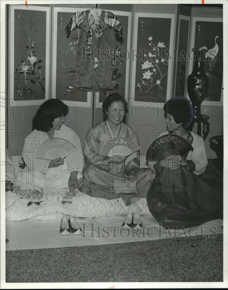 1978, Japanese ladies relax at International Day, Huntsville, Alabama - Historic Images