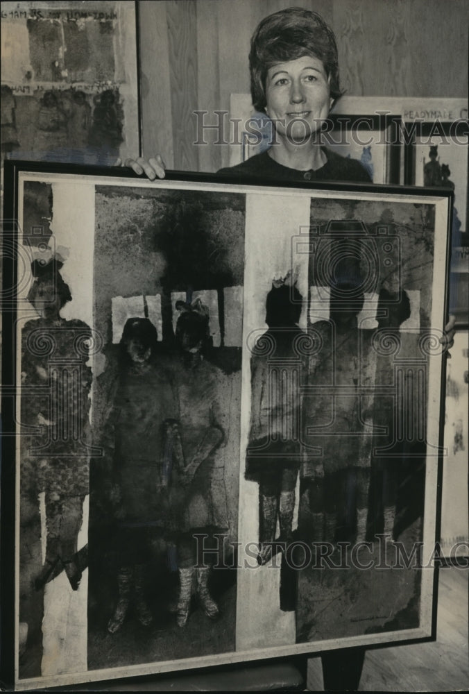 1966, Artist Doris Kennedy holds painting at Sidewalk Show - Historic Images