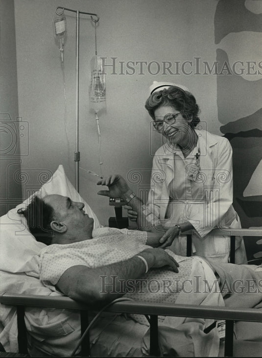 1985 Mrs. Armour Checks Earl Hensley, Walker Medical Center, Alabama - Historic Images