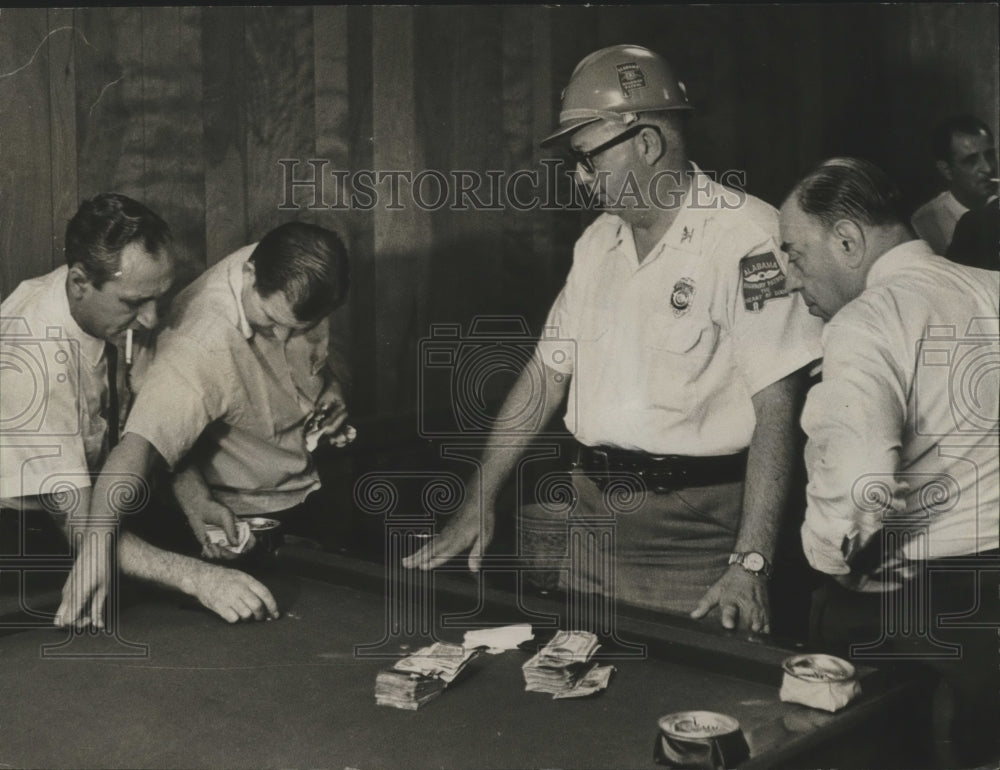 1963 Press Photo Men Carried by Men at &quot;Kid McCoy&quot; Place, Alabama - abna14904- Historic Images