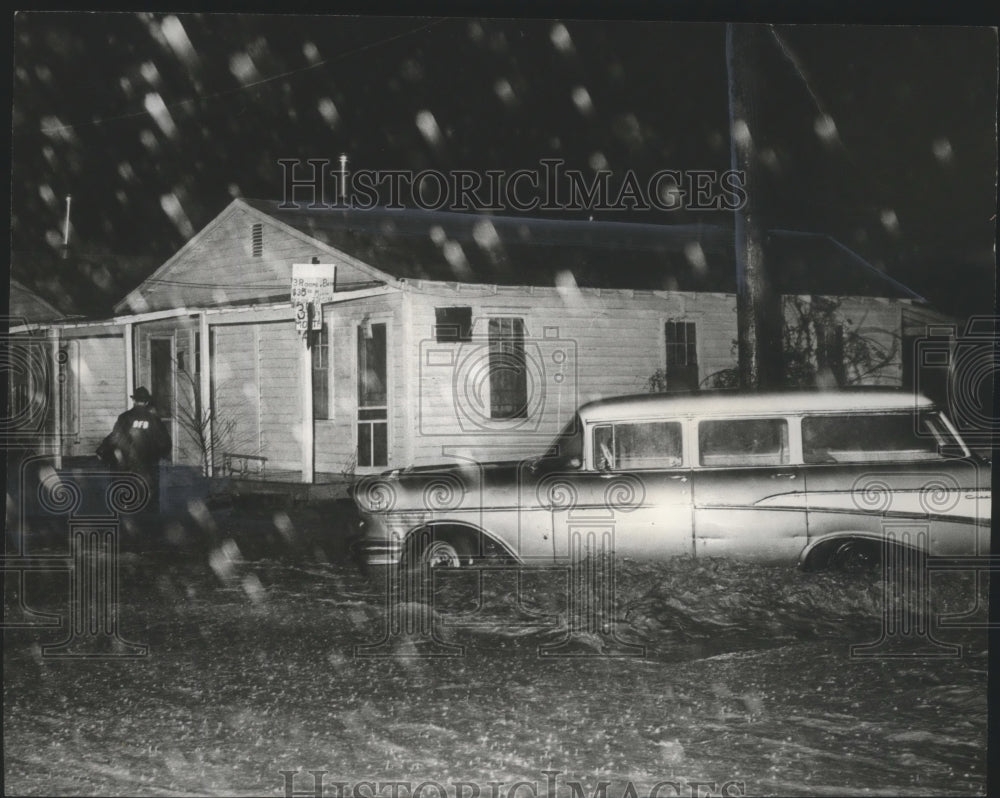 1971, Firemen inspect homes in Birmingham, Alabama during Flooding - Historic Images