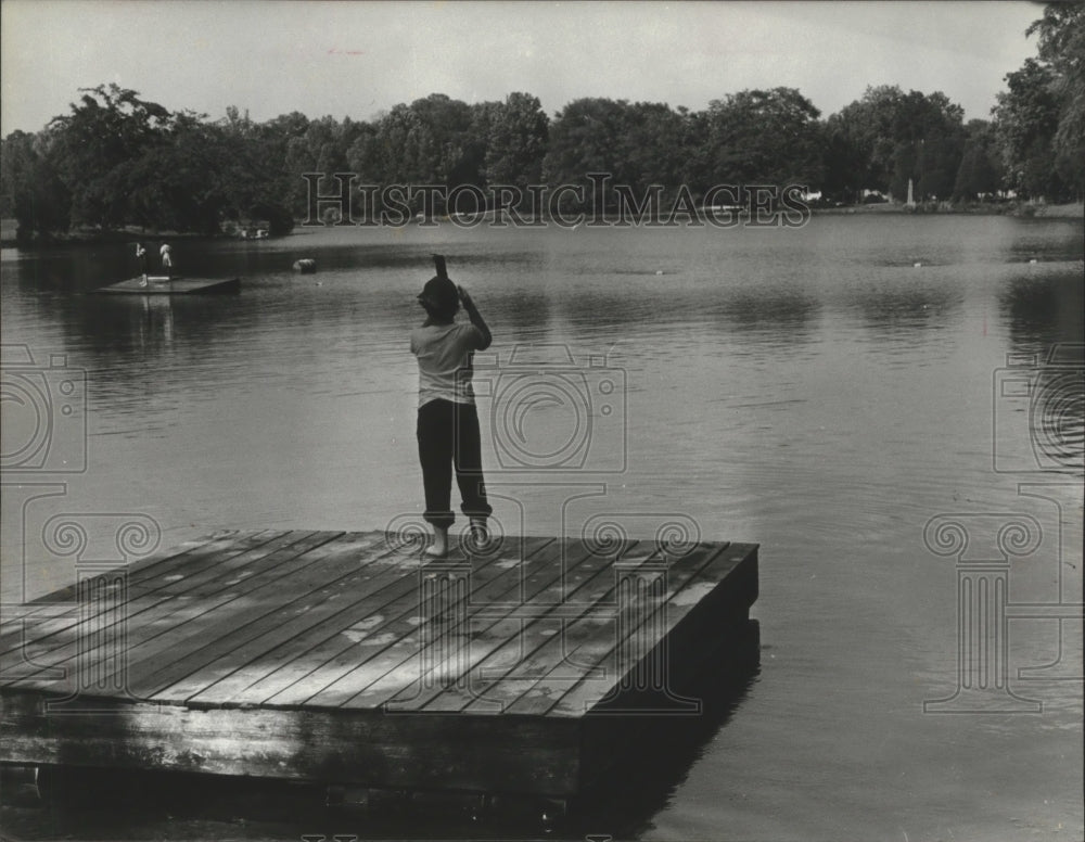 1979 Modern Huck Finn fishing at Lake at Indian Springs School - Historic Images