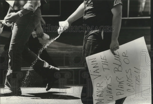 1973, Birmingham, Alabama City Employee Demonstrates-Throws Grits - Historic Images