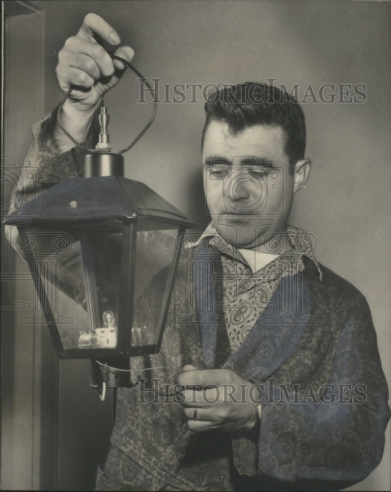 1960, Patient Jim Boggan lights a candle, Jefferson County Sanatorium - Historic Images