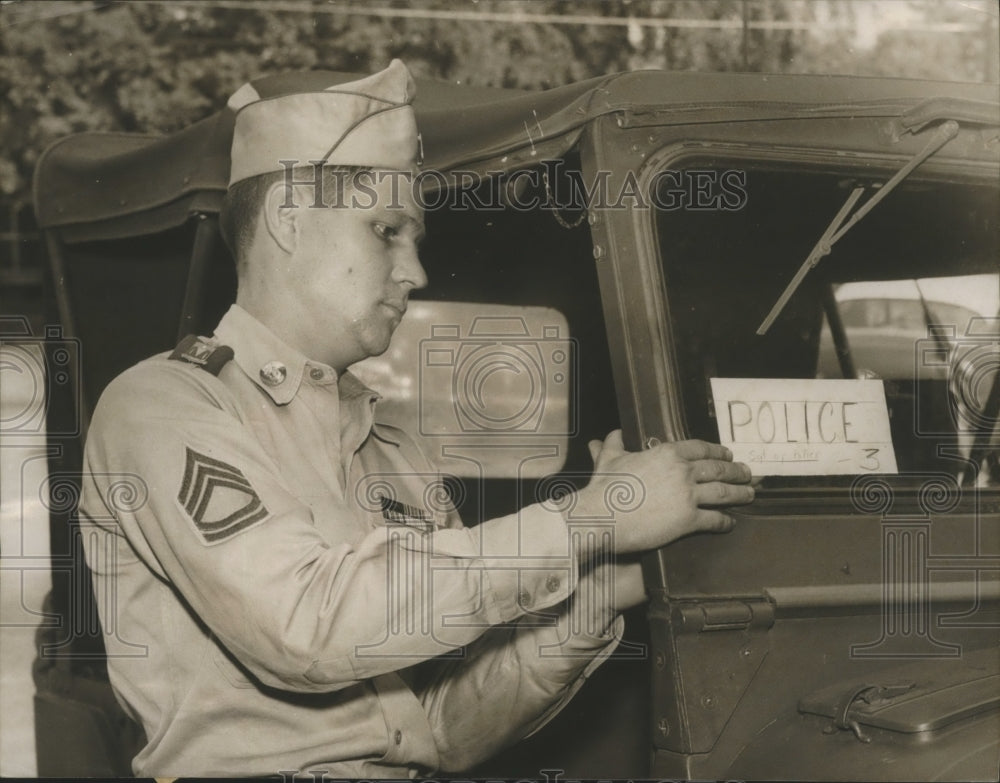 1954, C. E. Kimbrel puts &quot;Police&quot; Sign on National Guards Jeeps - Historic Images