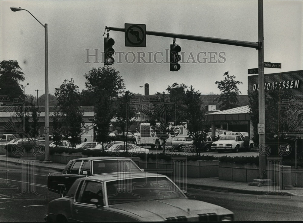 1984 Traffic in North Birmingham business district, Alabama - Historic Images
