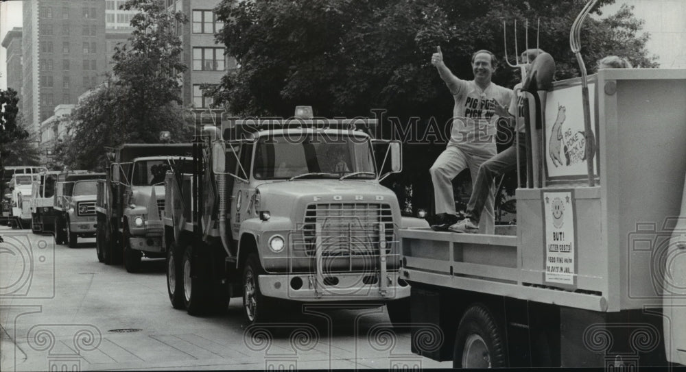 1980, Pete Clifford rides truck in Pig Poke Pickup parade, Alabama - Historic Images