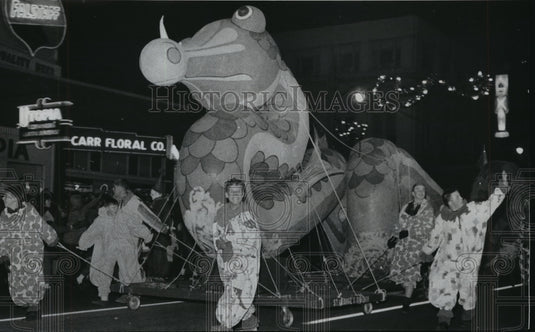 1966, Boys Leading Dragon Balloon in Parade, Birmingham, Alabama - Historic Images