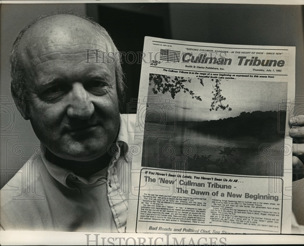 1983 Raymond Clarke with tabloid edition of Cullman Tribune, Alabama - Historic Images