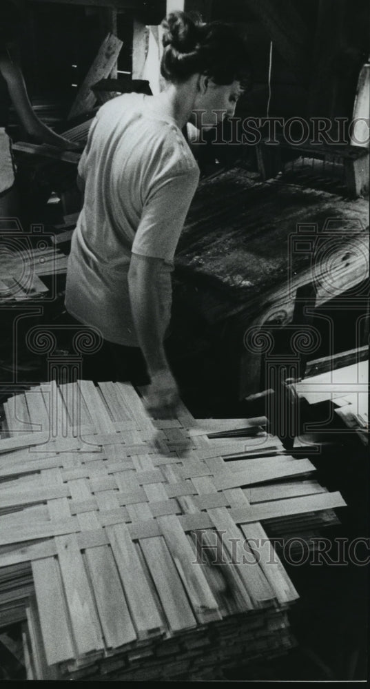 1978, Unidentified lady stacks slats at Basket Factory, Nectar - Historic Images
