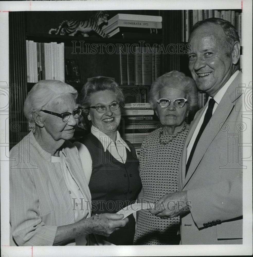 1973 Dr. Harry Philpott, receives scholarship funds, Auburn, Alabama-Historic Images