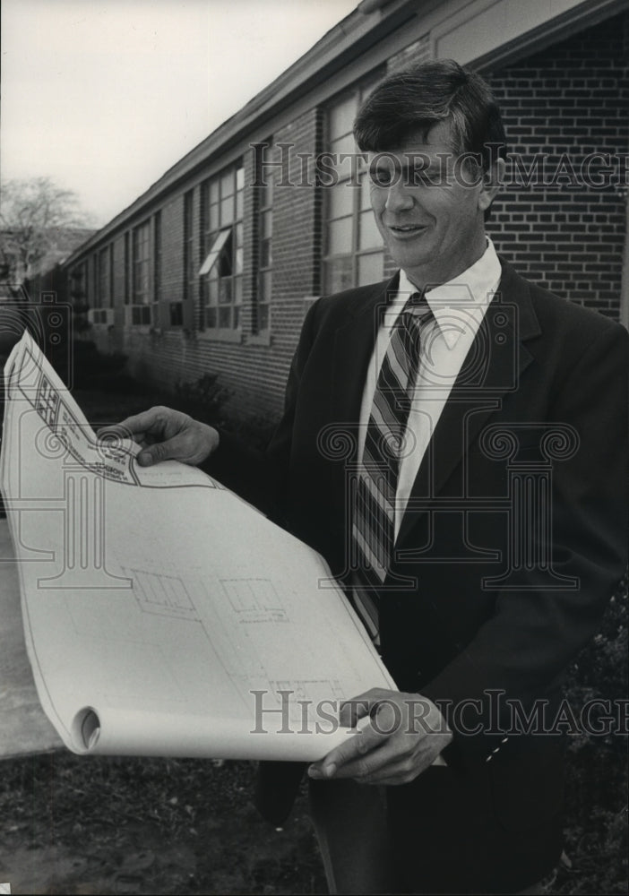 1983 Roger Pate with plans for new Pell City High School, Alabama - Historic Images