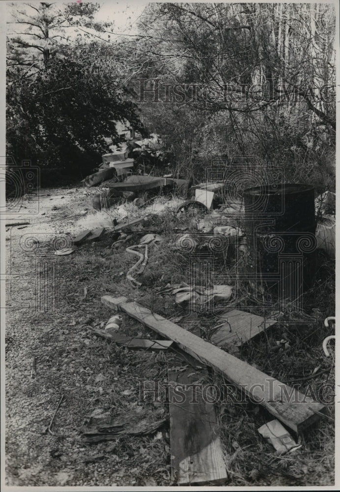 1990 2436 Pine Cone Circle is a Trashy Lot Covered in Litter - Historic Images