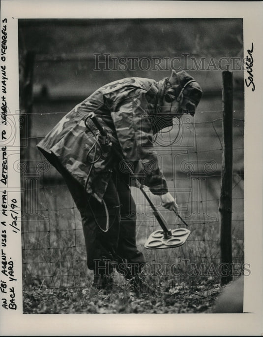 1990, FBI agent searches yard of Wayne O'Ferrell, bombing suspect - Historic Images