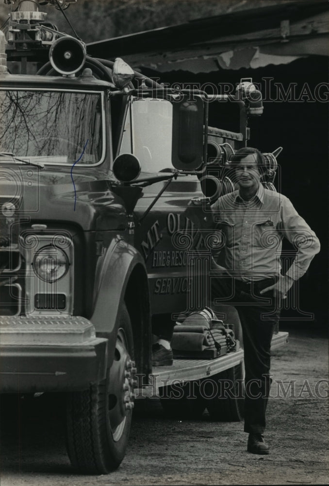 1983, Mount Olive Fire Chief A. R. Dobbs and one of district&#39;s trucks - Historic Images