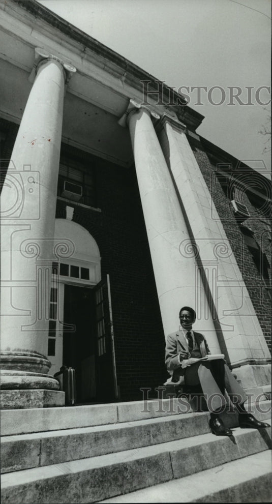 1986 Miles Student Rufus Lewis takes break from studies at college - Historic Images