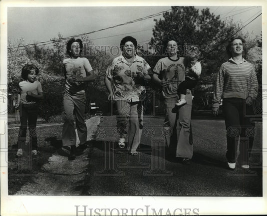 1975, Entertainer Freada Wallace with Neighborhood Kids playing Ball - Historic Images