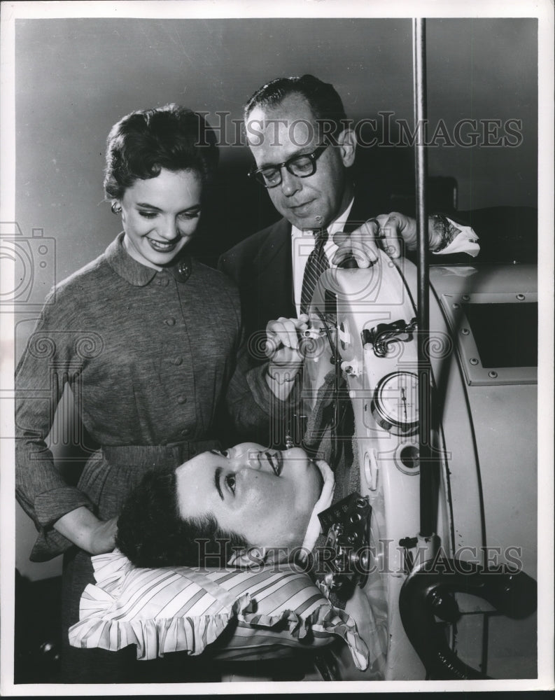 Lili Gentle and Man Looking at Woman in Iron Lung-Historic Images