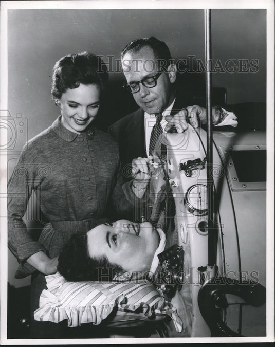 Lili Gentle and Man Looking at Woman in Iron Lung-Historic Images