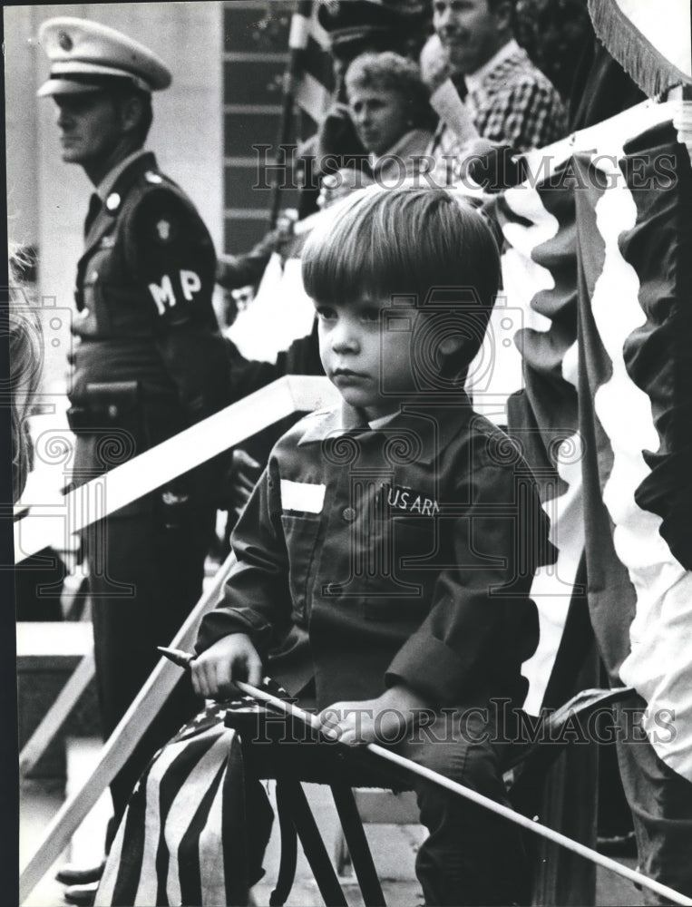 1979, Brooks Emory III Watching Veterans Day Parade - abna17367 - Historic Images