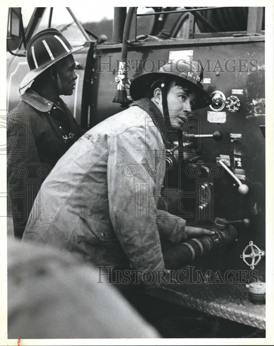 1978, Kermit Todd and Perry Gothard hooking up fire hoses, Alabama - Historic Images