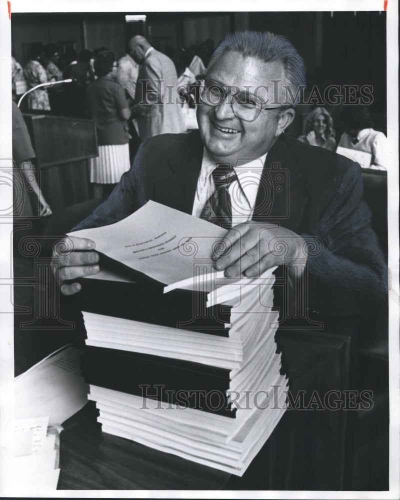 1977, Mayor Vann distributing copies of proposed budget, Birmingham - Historic Images