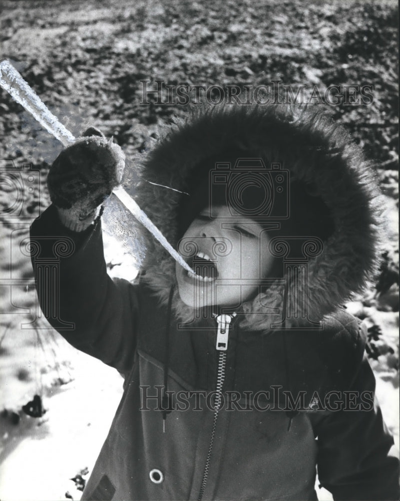 1980 Jaime Jones of Palmerdale, Alabama, Savors an Icy Treat - Historic Images