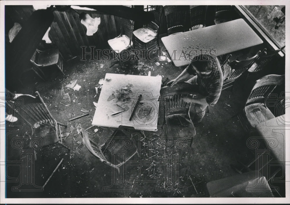 1989 Kenneth George cleans broken Window Glass at Baby Doe's Place - Historic Images