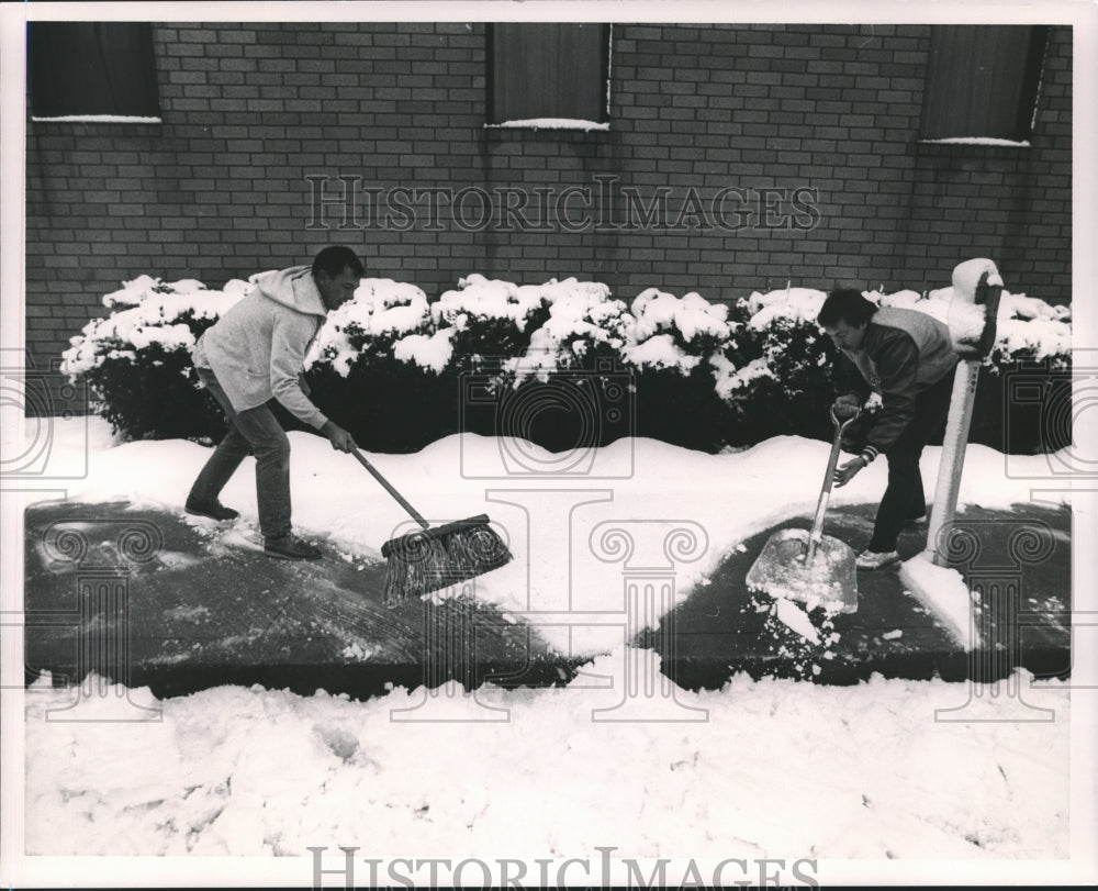 1987, Quinton Nail, Jeff Nail clean sidewalk in front of IRS Building - Historic Images