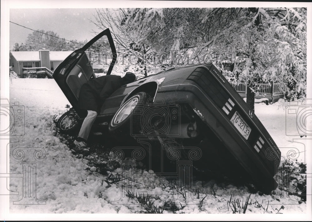 1987, Car slides off icy road at Springville Road near Chalkville - Historic Images