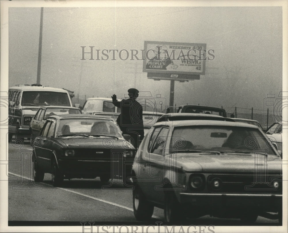 1985, Officer directs traffic at wreck on Green Springs Road, Alabama - Historic Images