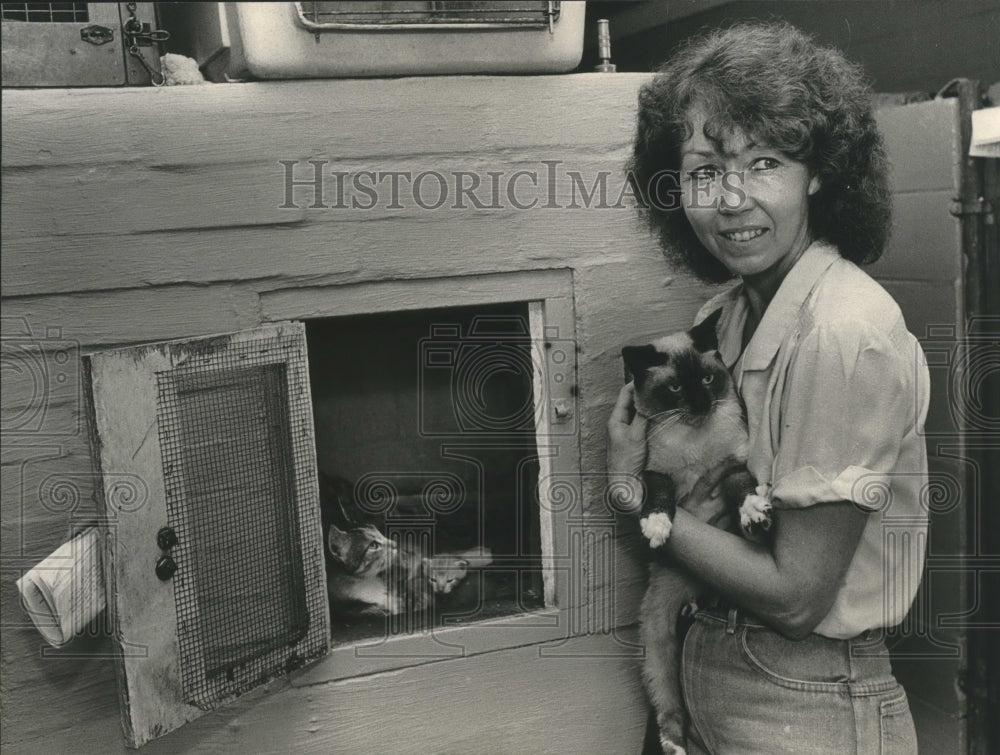 1983, Ruthann Cumbo with Cats at West Jefferson Humane Society - Historic Images