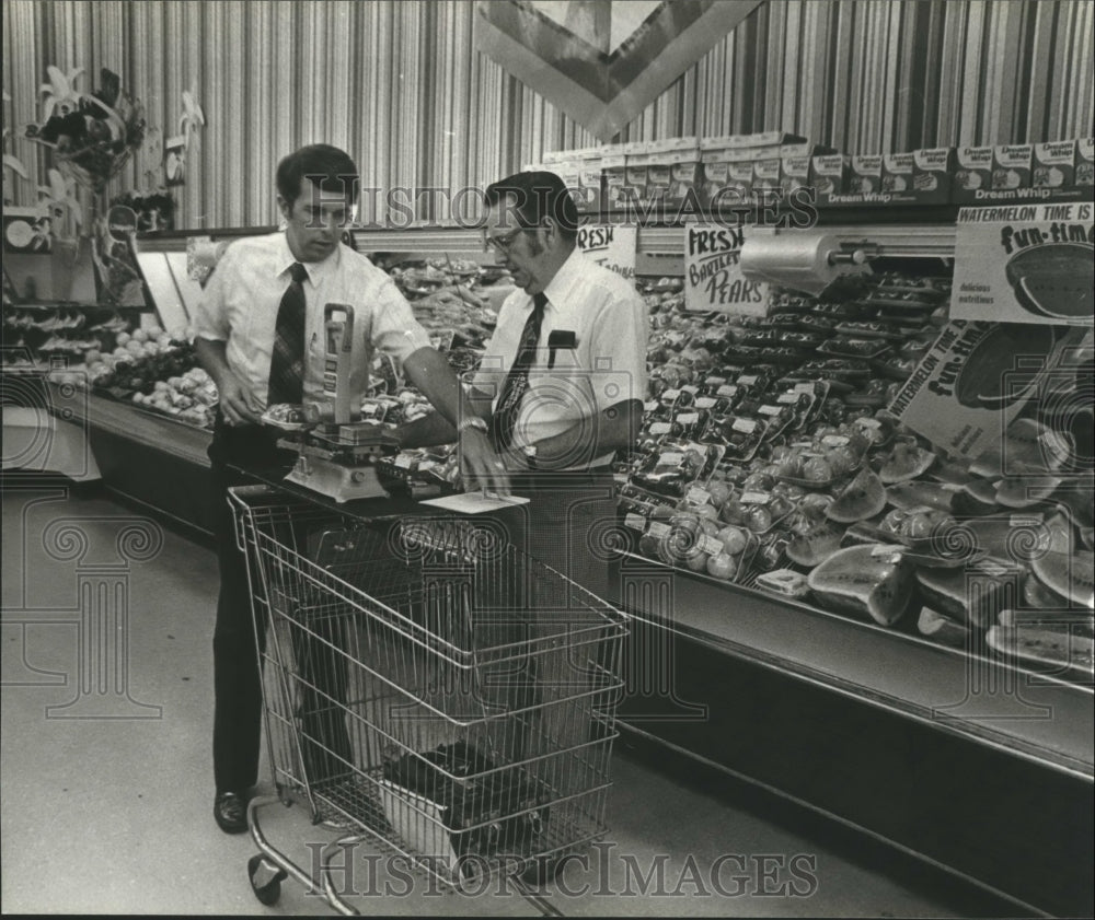 1979 Don Stagg, Don Hamilton Weigh Items in Grocery Store, Alabama - Historic Images