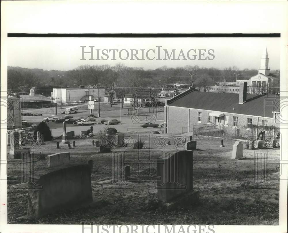 1980, Roebuck Cemetery with businesses in background, Birmingham, AL - Historic Images