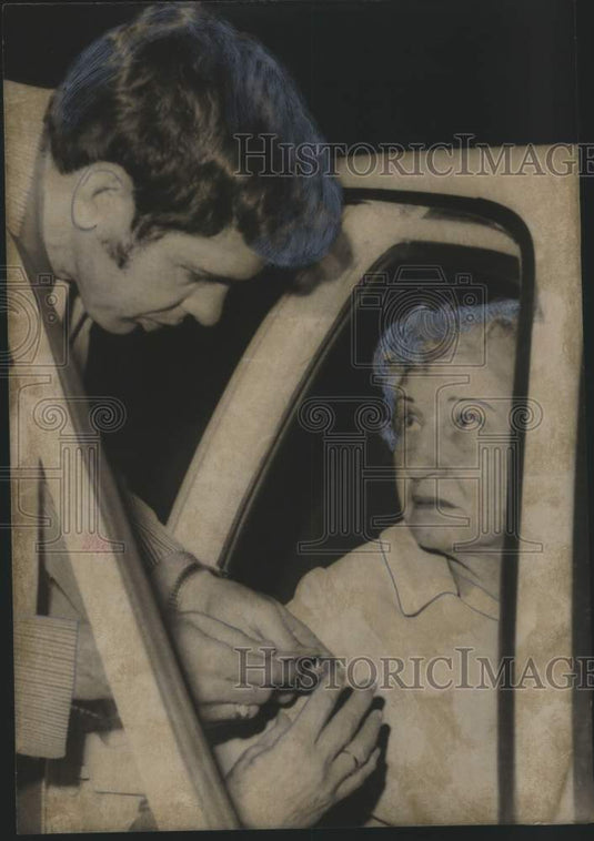 1972, George Wallace Assassination Attempt: Man Talks to Woman in Car - Historic Images