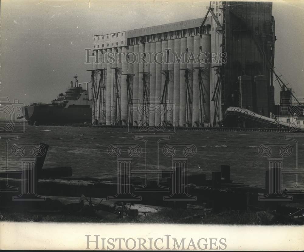 Press Photo Grain elevator at waterfront with ship, aerial view - abna18542 - Historic Images