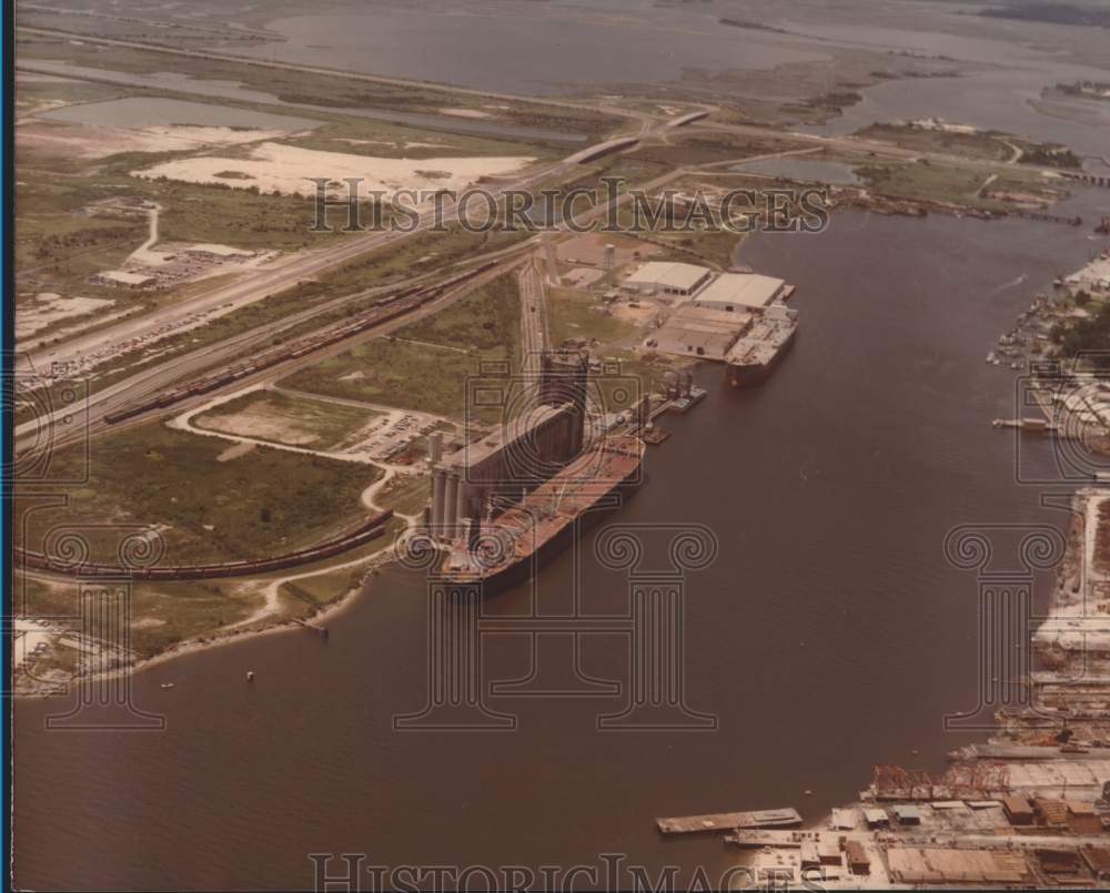 Grain elevator at waterfront, aerial view - Historic Images