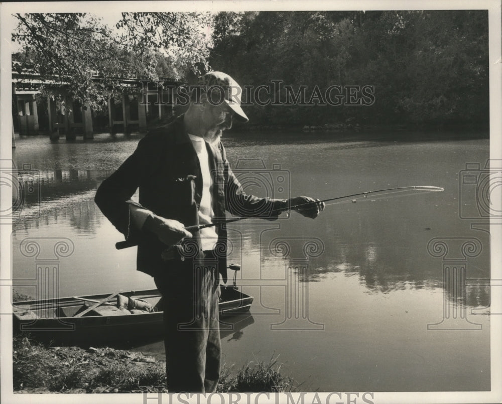 1989, Jack Williams fishes at Choccolocco Creek - abna18741 - Historic Images