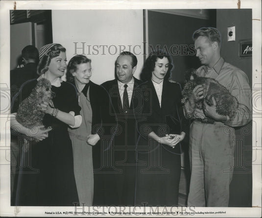 1952, Joy Ruth Williams, with others, on set of "Westward the Women" - Historic Images