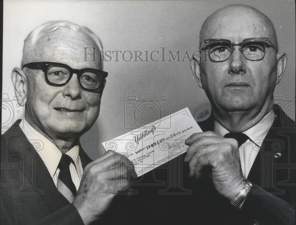 1968, Milton Yeilding Presents Check to JW Lanier for Pension Fund - Historic Images